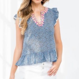 THML embroidered neckline, ruffled, blue cheetah-print top